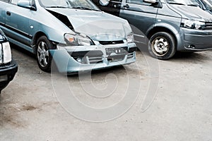 Bonnet car after car accident near modern automobiles