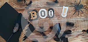 Boo - Halloween decoration on wodden background