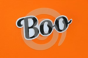 Boo. Painted lettering black oil paint on a white background, isolate, Halloween concept