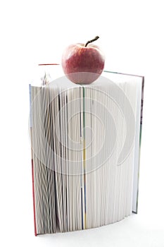 Book and apple