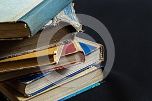 Book background. Stack of books in the library. Old yellow pages of paper books. Learning and knowledge