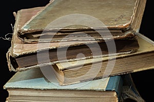 Book background. Stack of books in the library. Old yellow pages of paper books. Learning and knowledge