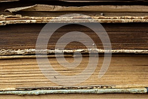 Book background. Stack of books in the library. Old yellow pages of paper books. Learning and knowledge