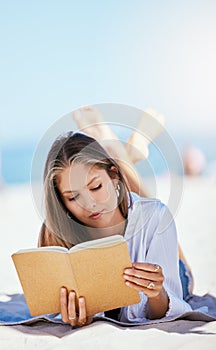 Book, beach and woman reading on vacation, holiday or summer travel in nature outdoor with mockup space. Relax, novel