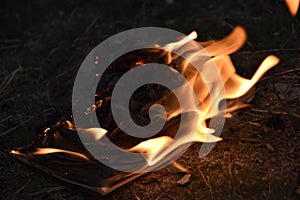 Book burning fire flame page