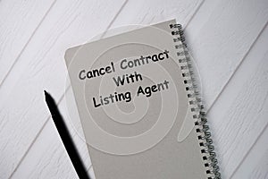 Book about Cancel Contract With Listing Agent isolated on wooden table
