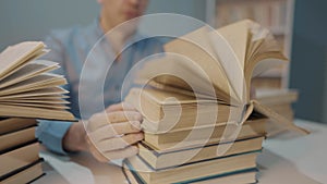 book close-up flipping pages. man reading a book in the library. education bookstore concept. university book turn pages