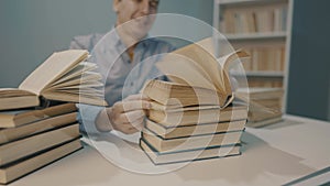 book close-up flipping pages. man reading a book in the library. education bookstore concept. university book turn pages