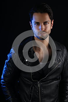 Book cover for a vampire novel - Handsome man wearing a leather jacket photo