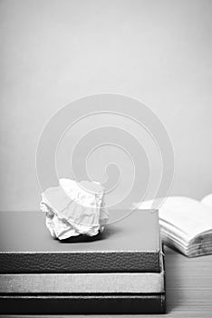 Book and crumpled paper black and white color tone style