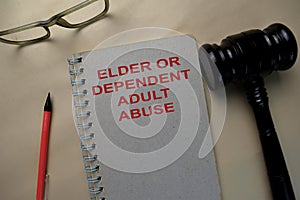 The Book of Elder or Dependent Adult Abuse on office desk photo