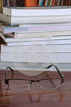 Book with eyeglasses