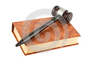 Book and gavel isolated over white