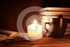Book glasses candle night