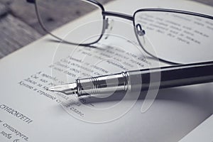 Book, glasses and pen - vintage style