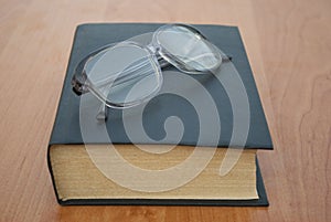 Book and glasses.
