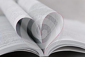 Book with heart shape, closeup