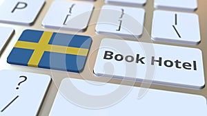 Book hotel text and flag of Sweden on the buttons on the computer keyboard. Travel related conceptual 3D animation