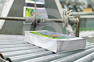 Book, magazine, production line into press plant house