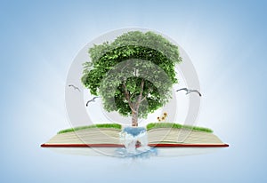 Book of nature with grass and tree growth on it over white blue