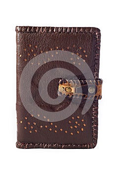 book or notebook in old vintage leather cover on white