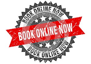 book online now round grunge stamp. book online now