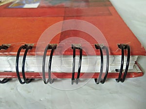 Book is orange colour.Design of book.