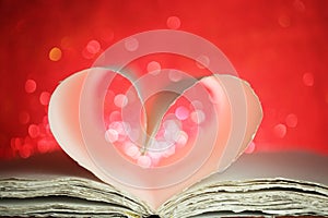 Book pages in a heart