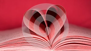 book pages in pink heart shape