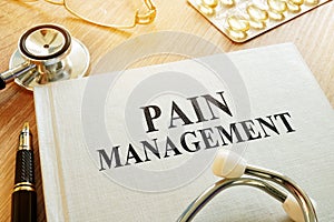 Book about Pain management. Chronic care management. photo