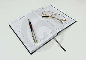 Book Pen and Spectacles