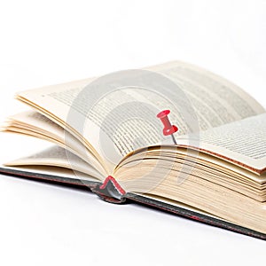 Book with Pin isolated on white background