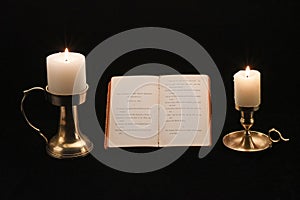 Book of poems and candles photo