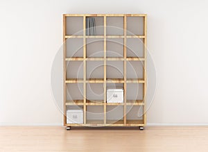 Book rack isolated against the white wall in bright interior