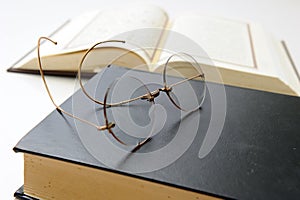 Book and reading glasses