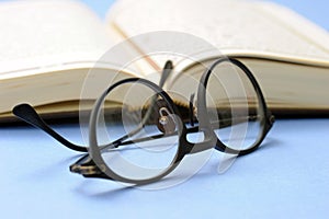 Book and reading glasses