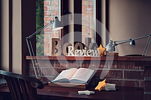 Book review, reader desk and rating stars