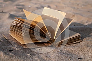 Book on sand