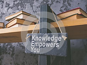 Book shelf and plate knowledge empowers you.