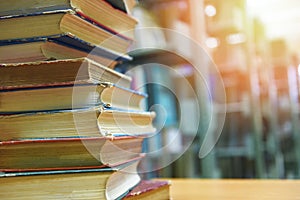 Book stacked in library education concept back to school and business study with old books on a wooden table