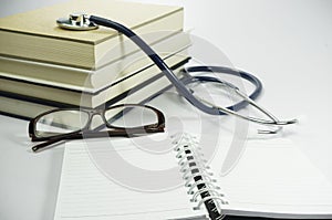 Book, Stethoscope and Glasses - Conceptual