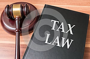 Book with tax laws. Justice and legislation concept photo