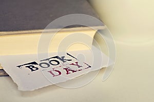 Book and text book day in a piece of paper