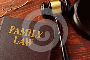 Book with title family law on a table.