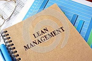 Book with title lean management on a table.