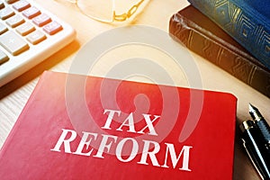 Book with title Tax reform on a table.