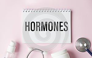 Book with words Hormones imbalance