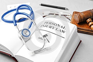 Book with words PERSONAL INJURY LAW