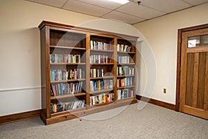 Bookcase in an empty room