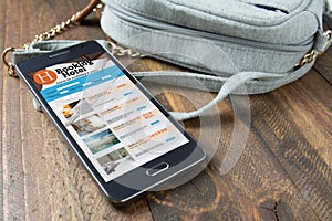 Booking hotel online,by smartphone . Travel and tourism concept.